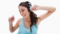 Woman dancing while listening to music