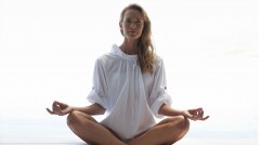 Attractive woman meditating