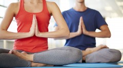 two people doing yoga